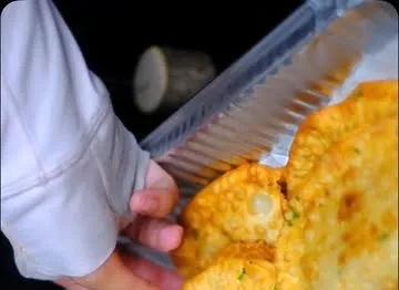 Homemade empanadas set out for a gym event